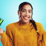 A smiling woman in a yellow sweater holding her hands out between "YES!" and "NO!" graphics, illustrating a dilemma easily solved by a digital Decision Wheel.