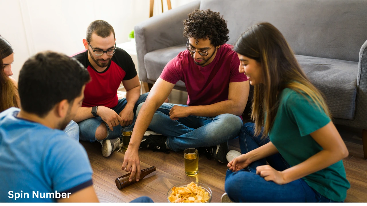 Group of friends playing spin the bottle and asking Truth or Dare Questions